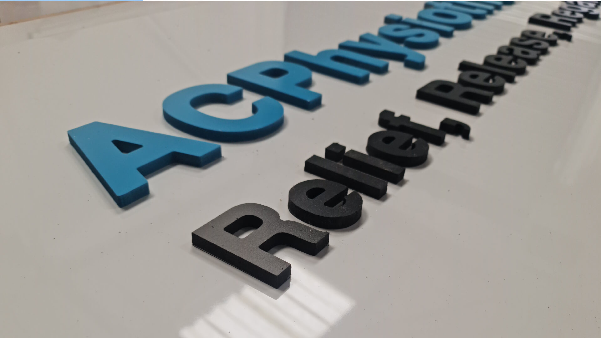 3D raised letters tray in Manchester