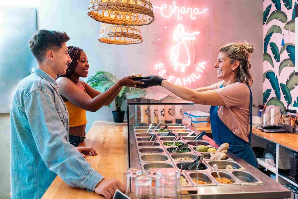 (This Image Shows an Interactive and Experiential Signage in a Resturant)
 restaurant signage