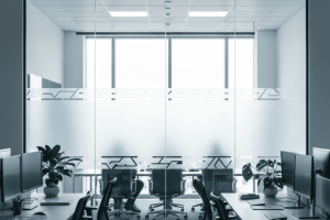 Window frosting privacy film applied to an office glass partition with a band pattern, enhancing confidentiality in a corporate setting.